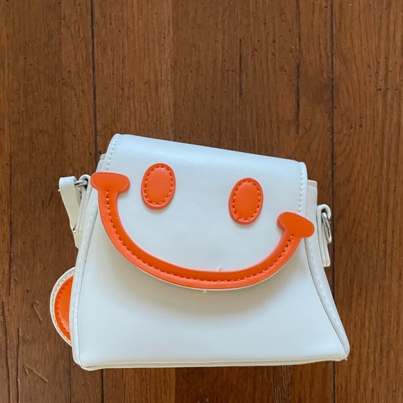 Hoodies for Heros Handbags - Hoodies for Hero’s White and Orange Smiley Face Mini Crossbody Bag